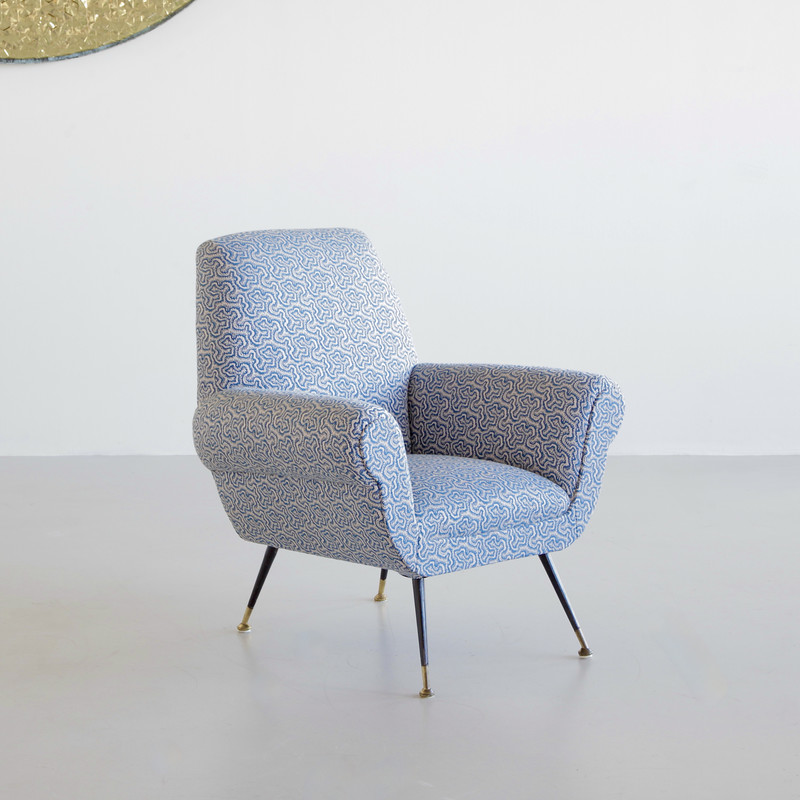 Armchair designed by Gigi RADICE for MINOTTI