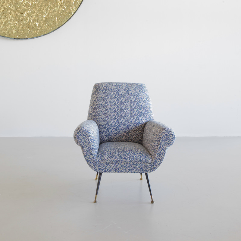 Armchair designed by Gigi RADICE for MINOTTI