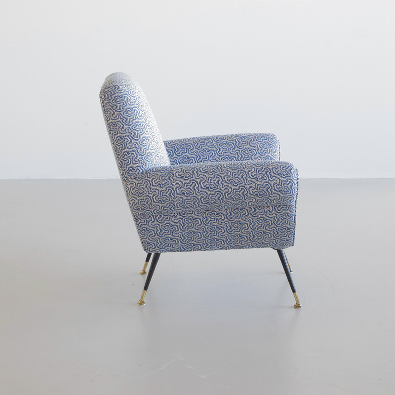 Armchair designed by Gigi RADICE for MINOTTI