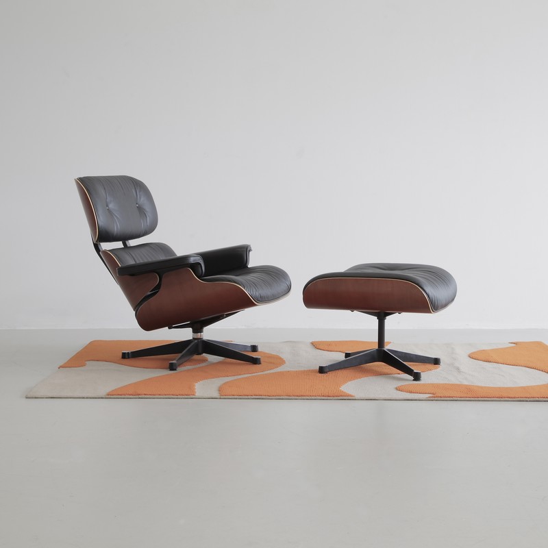 Lounge Chair and Footstool by Charles & Ray Eames for Vitra, 1999
