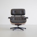 Lounge Chair and Footstool by Charles & Ray Eames for Vitra, 1999