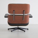 Lounge Chair and Footstool by Charles & Ray Eames for Vitra, 1999