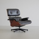 Lounge Chair and Footstool by Charles & Ray Eames for Vitra, 1999